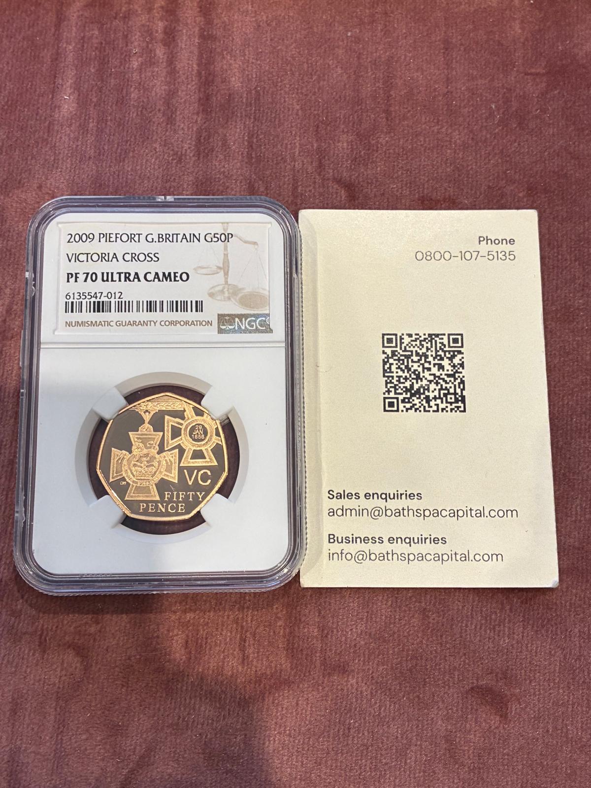 NGC PF70 2009 Victoria Cross 50p beside a BSC presentation card