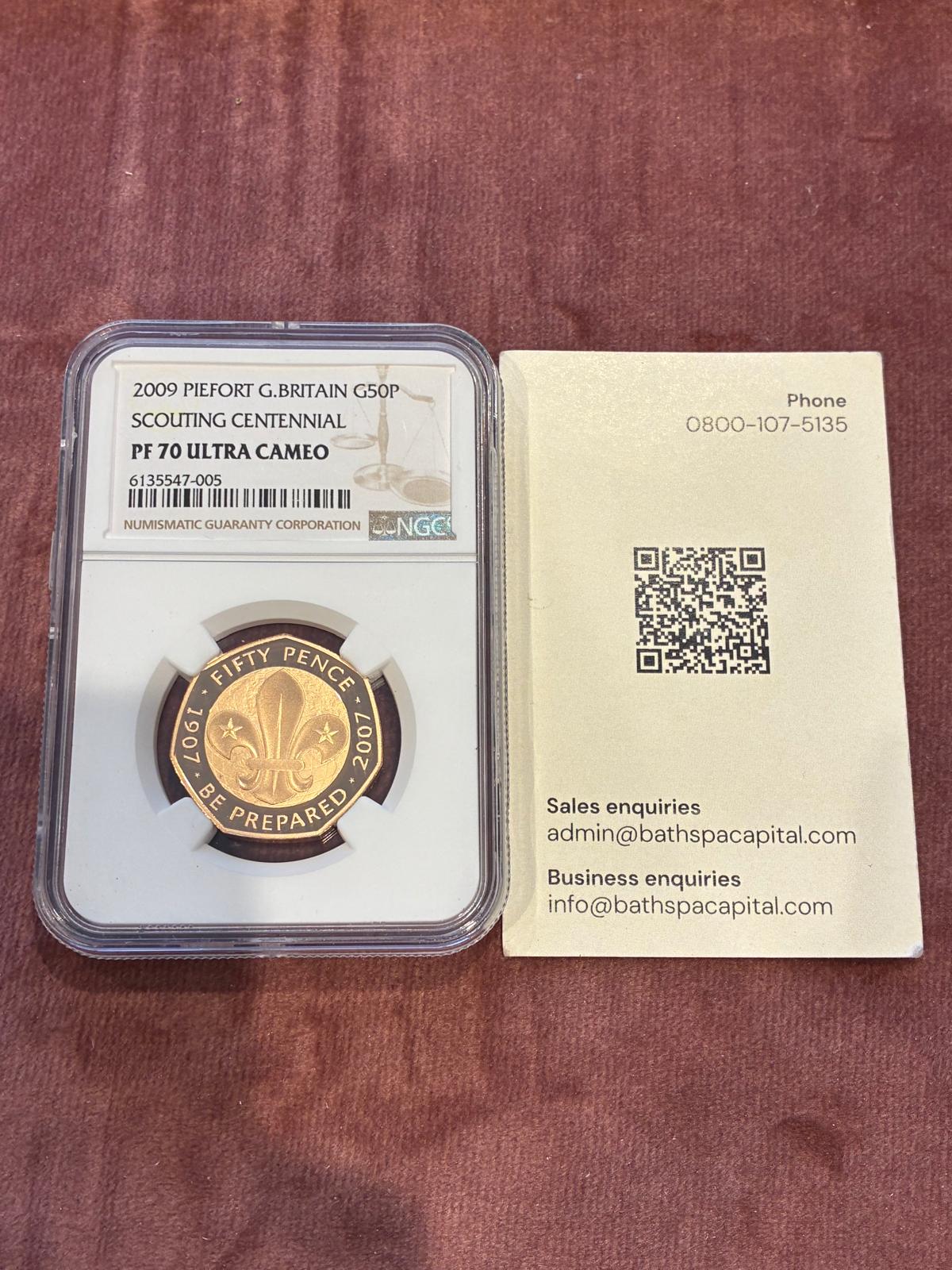 NGC PF70 2009 Scouting Centennial 50p beside a BSC presentation card
